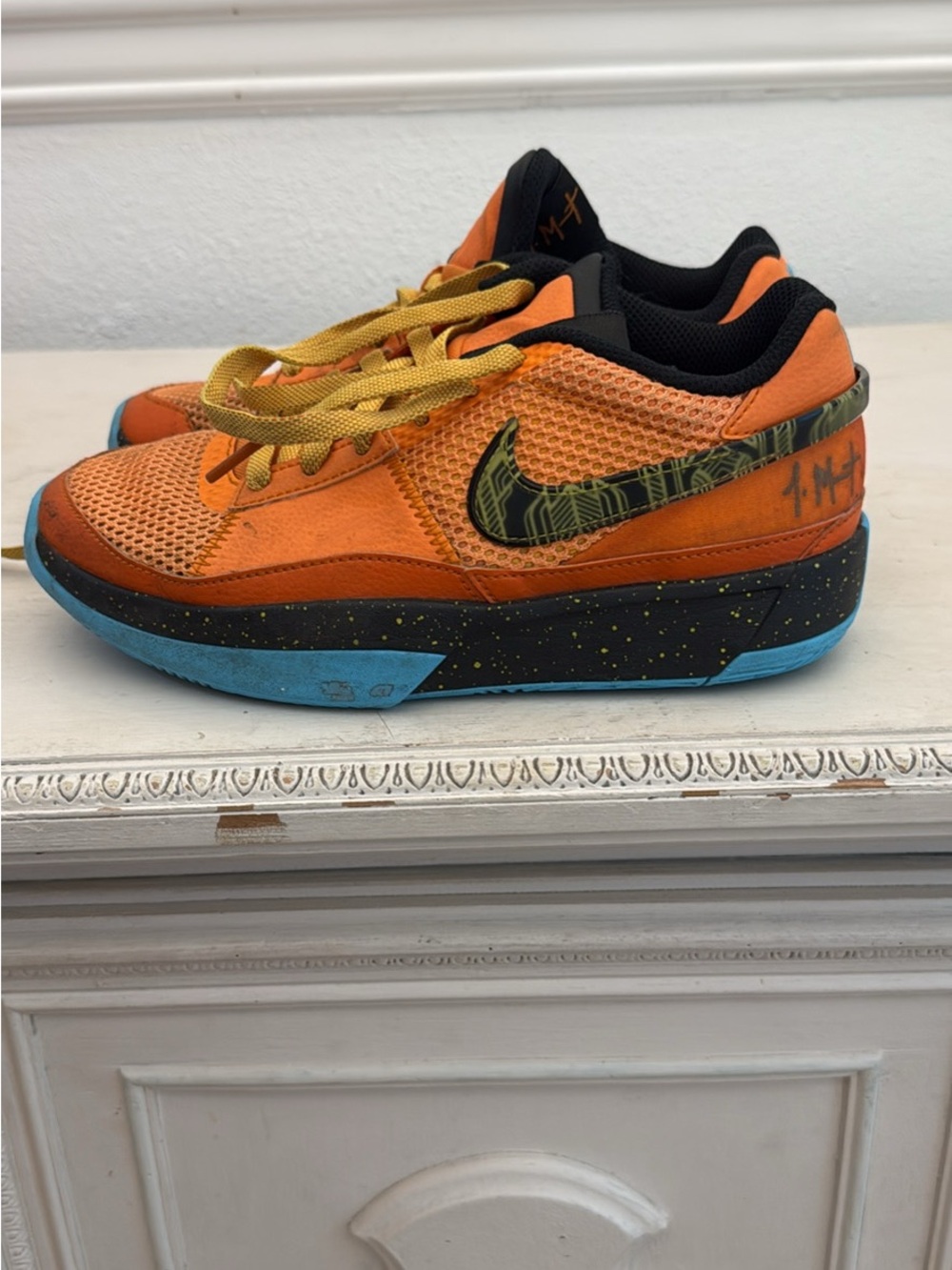 Nike Kids Orange and Black Low-Top Sneakers with Blue Outsole